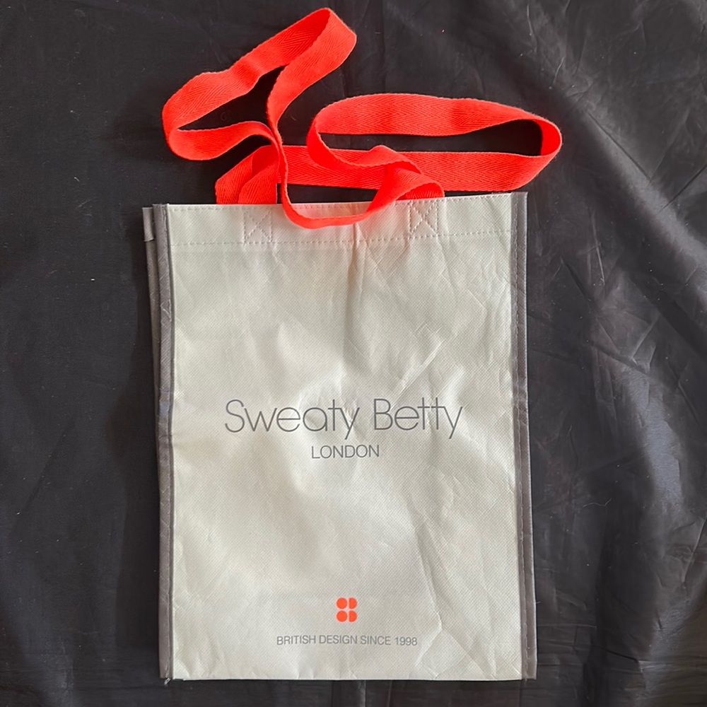 Sweaty Betty London Tote Bag Measures 12 inches top to bottom. Pre-owned